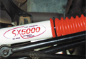 Image is representative of Tuff Country Steering Stabilizer.<br/>Due to variations in monitor settings and differences in vehicle models, your specific part number (66395) may vary.