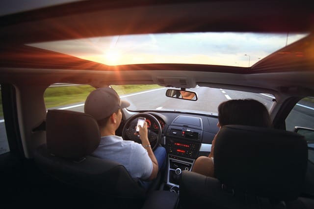 The Ultimate Playlist: Top 40 Best Road Trip Songs
