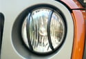 Image is representative of Rugged Ridge Euro Lighting Guards.<br/>Due to variations in monitor settings and differences in vehicle models, your specific part number (11231.21) may vary.