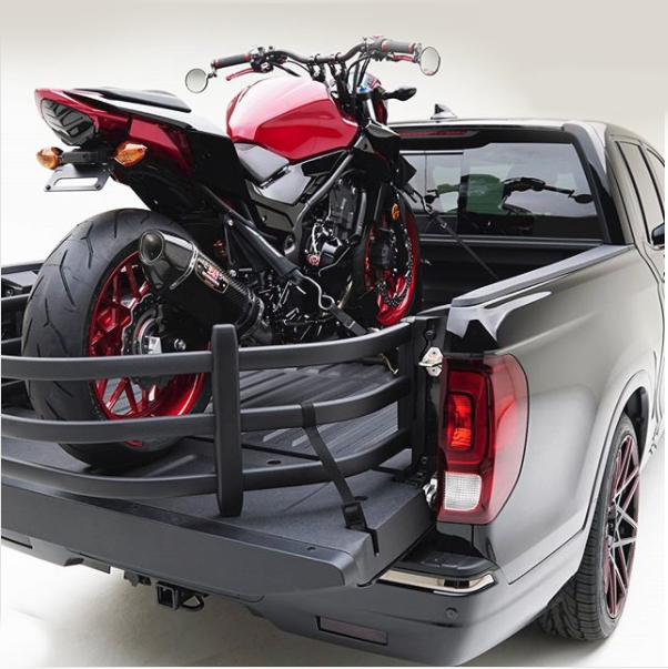 Lund-in-Motion Universal Truck Bed Xtender by AMP Research